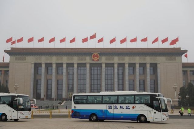 China to tighten grip over Hong Kong, sets GDP